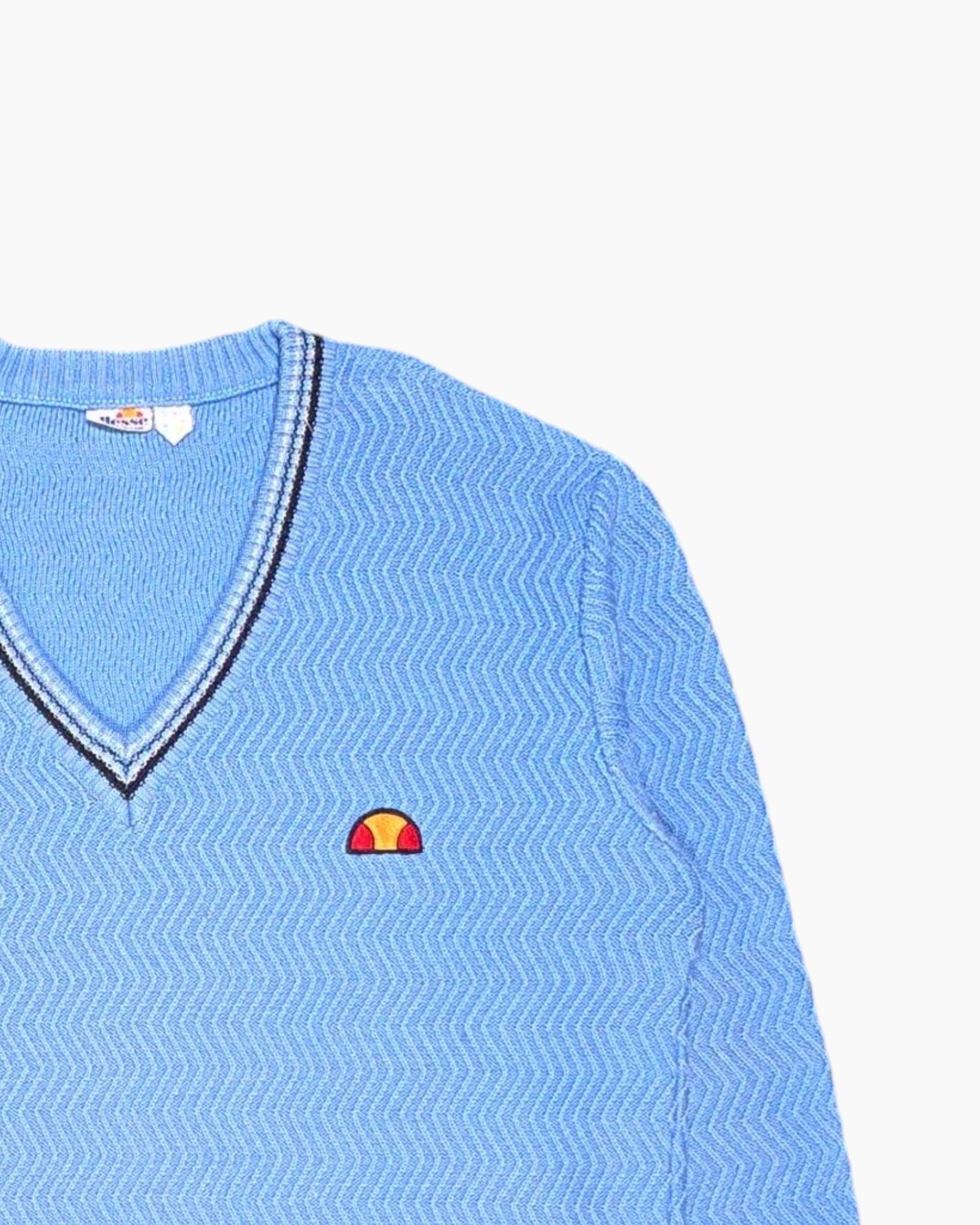 Front Detail 2 Vintage 80s/90s ellesse Pullover Sweater – Blue V‑neck with Embroidered Logo